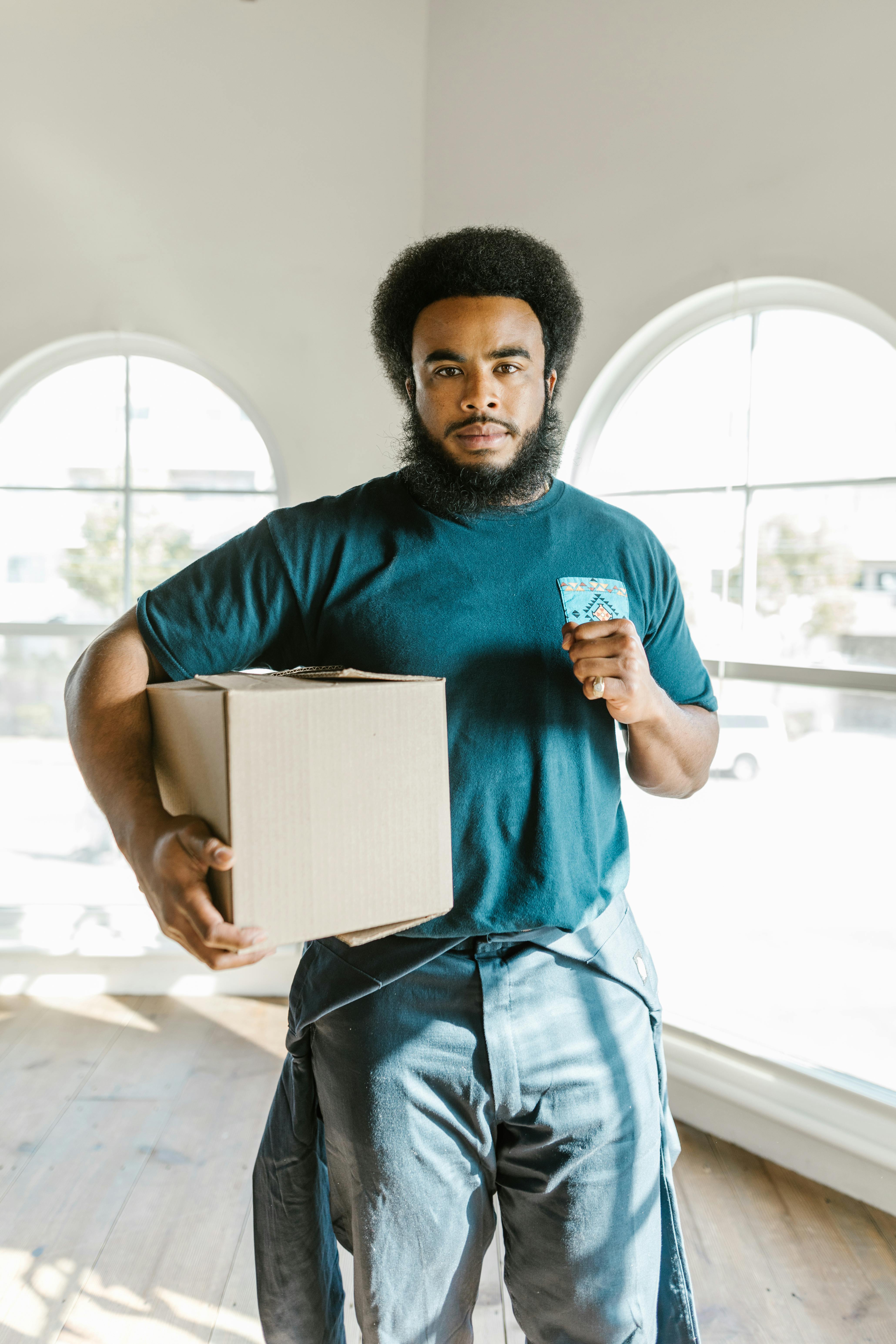 Mover loading a truck, focused and efficient